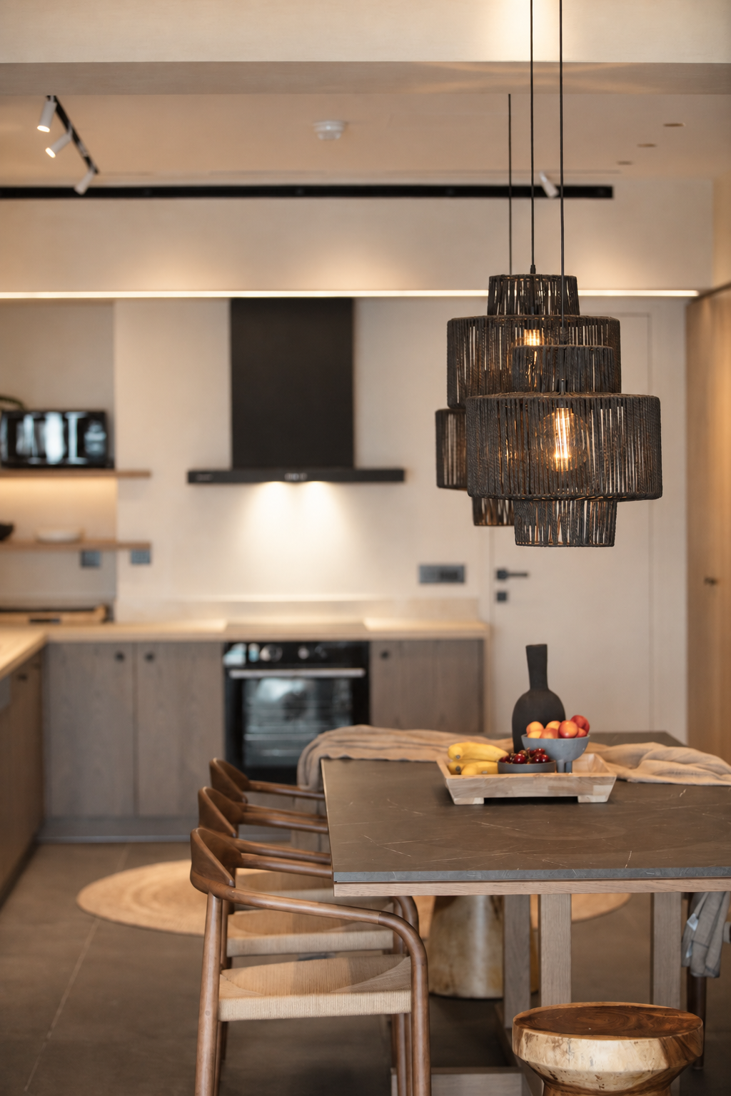 Casa Negro kitchen and dining table with woven pendant lights