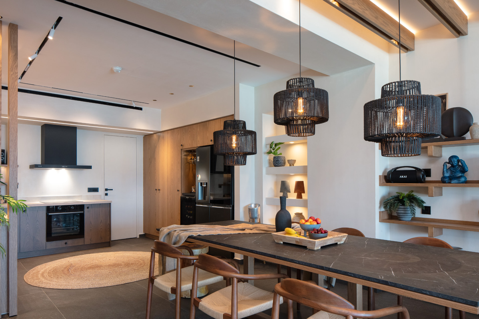 Kitchen and dining space with marble-top table