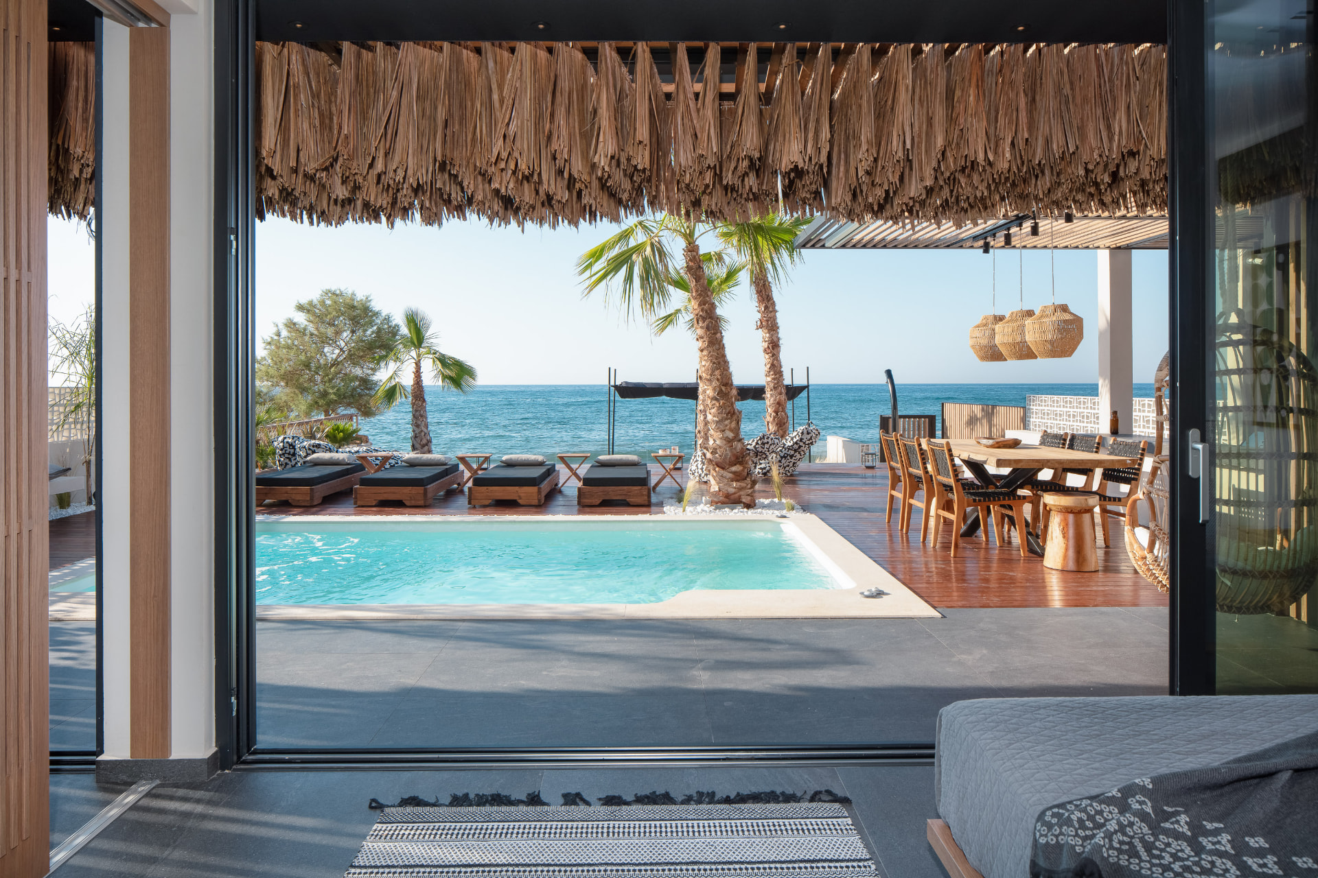 Master bedroom opening onto the pool terrace